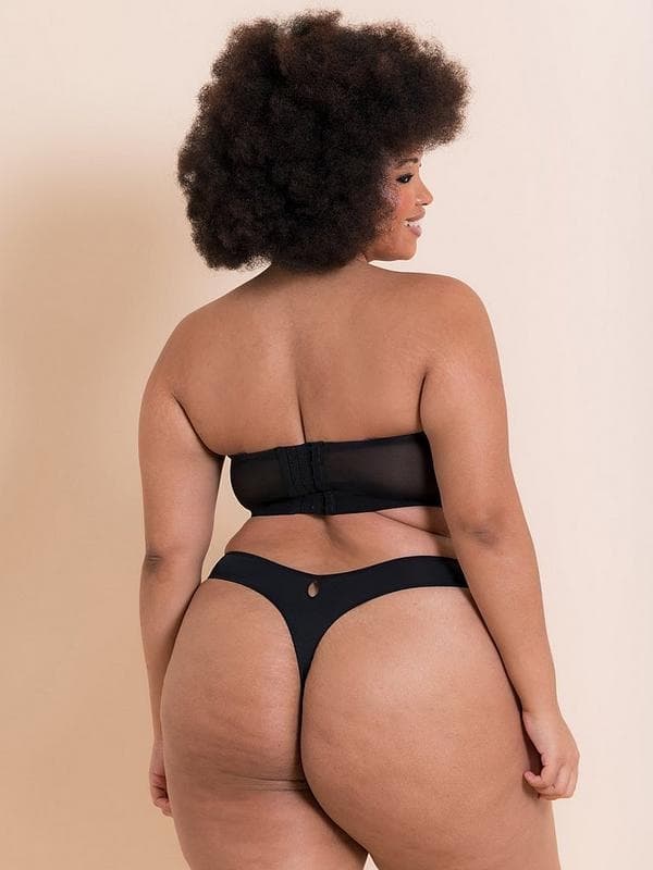 Zanele, plus-size black model, wearing her thong